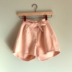 Small, blush rose, dress shorts.